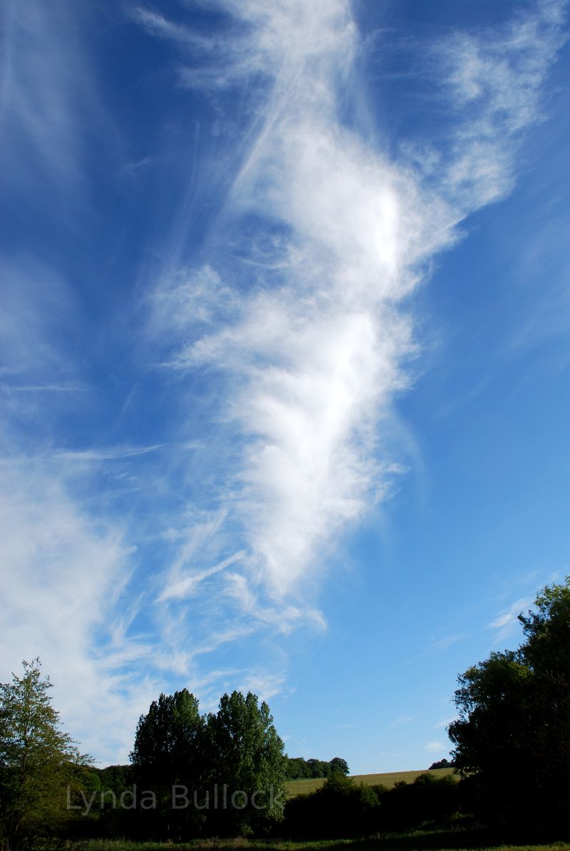 Faces in clouds above Chess Valley, Hertfordshire, England