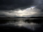 Rain storm over lake in Wales.