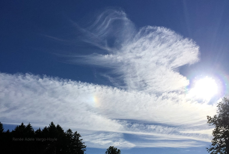 Sun through wispy clouds above Nazareth, PA